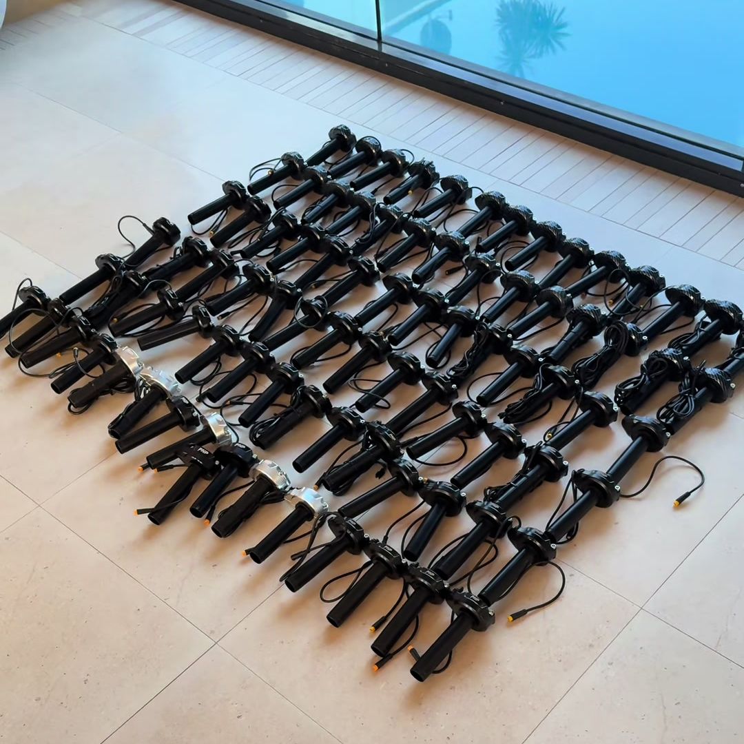 Rows of PlugNPlay throttles laid out before packing